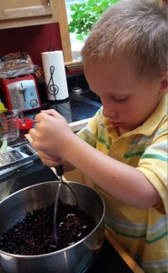 Aaron smashing huckleberries